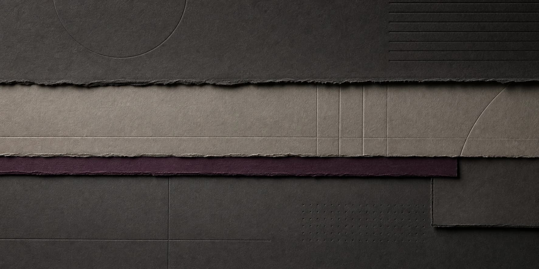 Precisely layered charcoal and warm grey paper with a muted plum seam